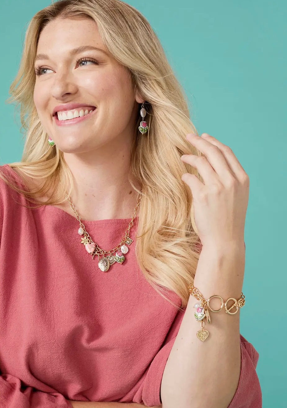 THE CHARMING BLOSSOM LOCKET NECKLACE