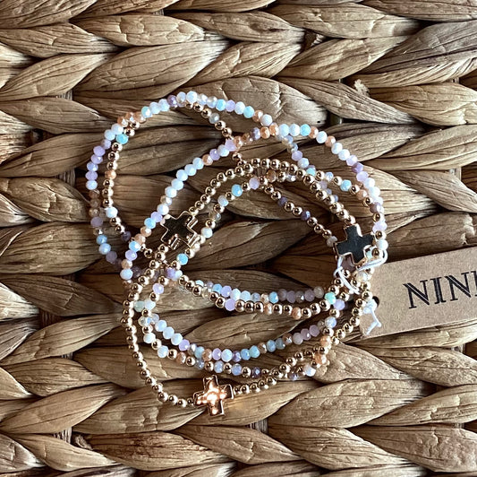 BEADED STRETCH BRACELETS WITH CROSS BEADS