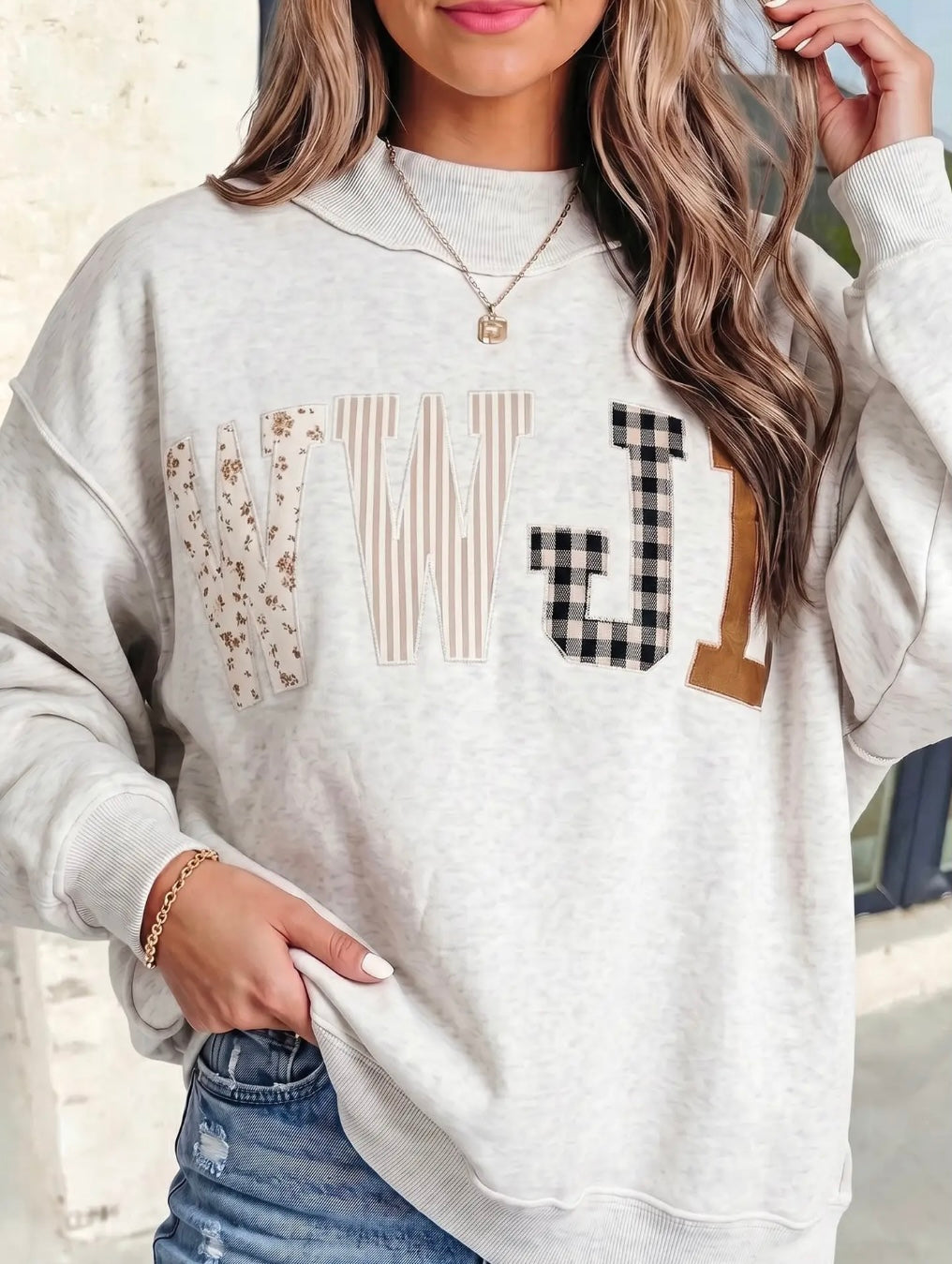 WWJD PATCHWORK SWEATSHIRT