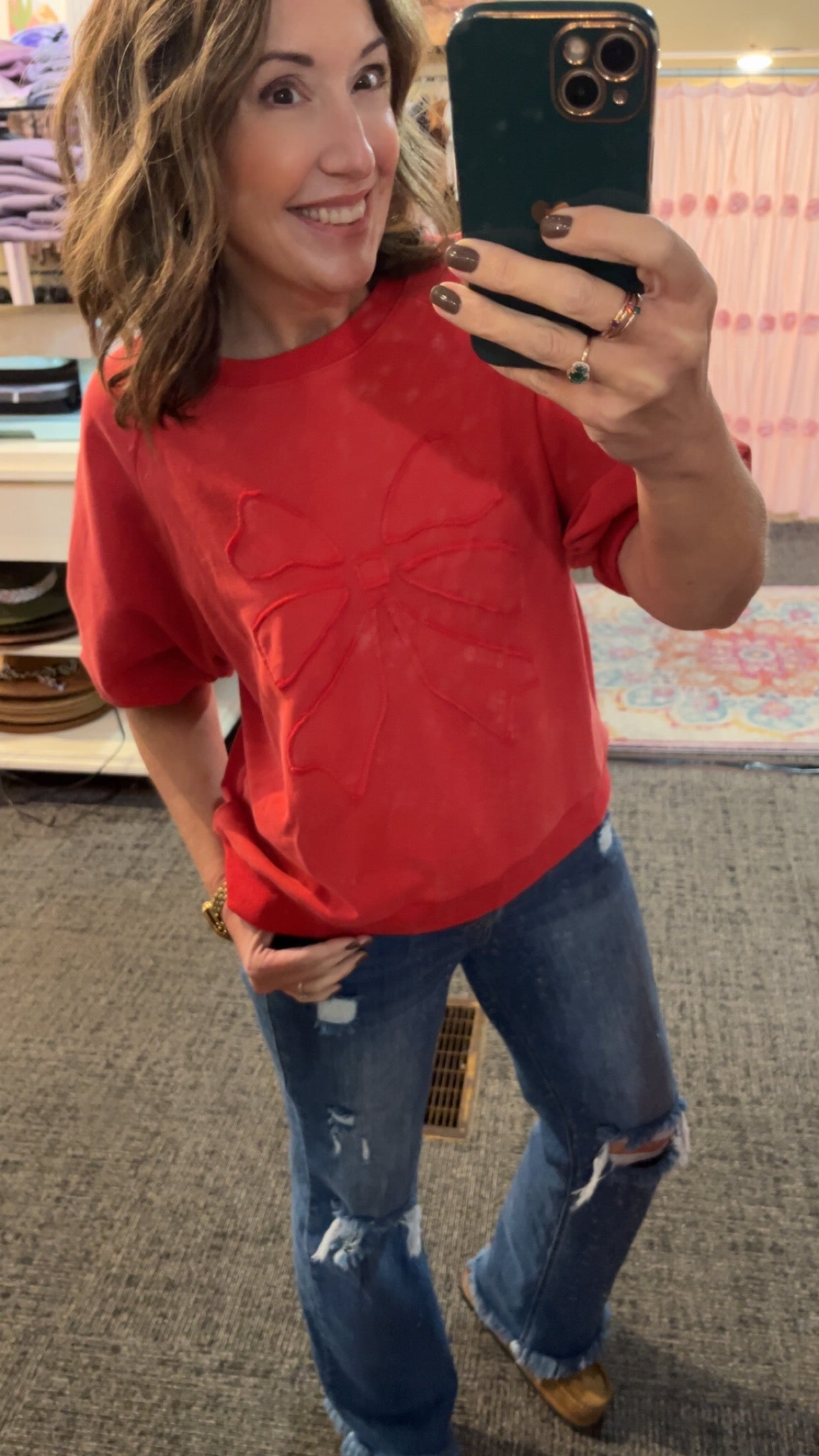 WRAPPED IN RED SWEATSHIRT